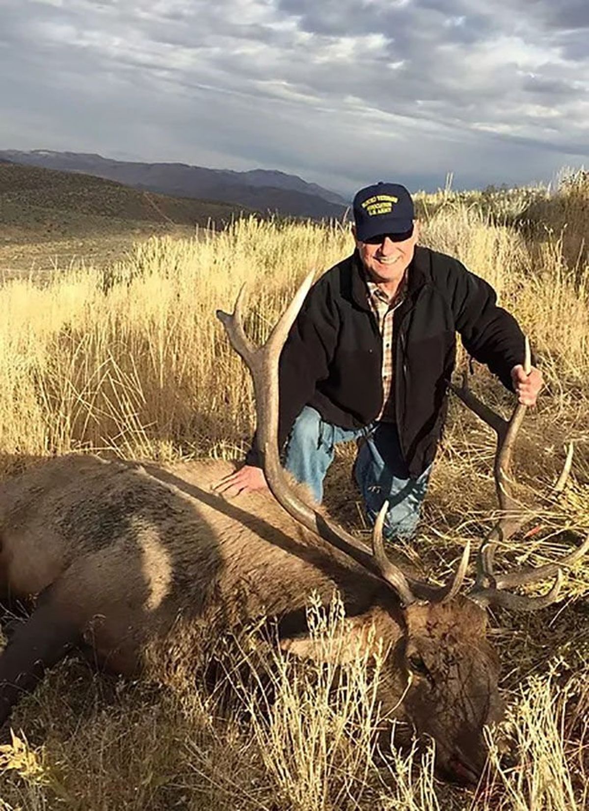 Dale Stamper poses with a bull elk he harvested in 2016 near Mountain Home, Idaho, as part of a disabled veterans hunt. Stamper, who was blinded during the Vietnam War, used a scope camera and guidance from a companion to shoot the elk. (Courtesy of Dale Stamper)