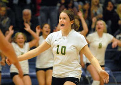 
Bree Arrhenius  of St. Maries is jubilant after the last side out of the match in which the Lumberjacks defeated Weiser. 
 (Jesse Tinsley / The Spokesman-Review)