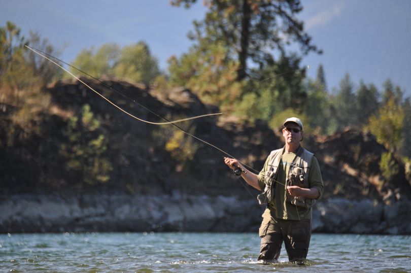 Chip Corsi fly fishing for trout on the Kootenai River upstream from Bonners Ferry, Idaho. (Rich Landers)