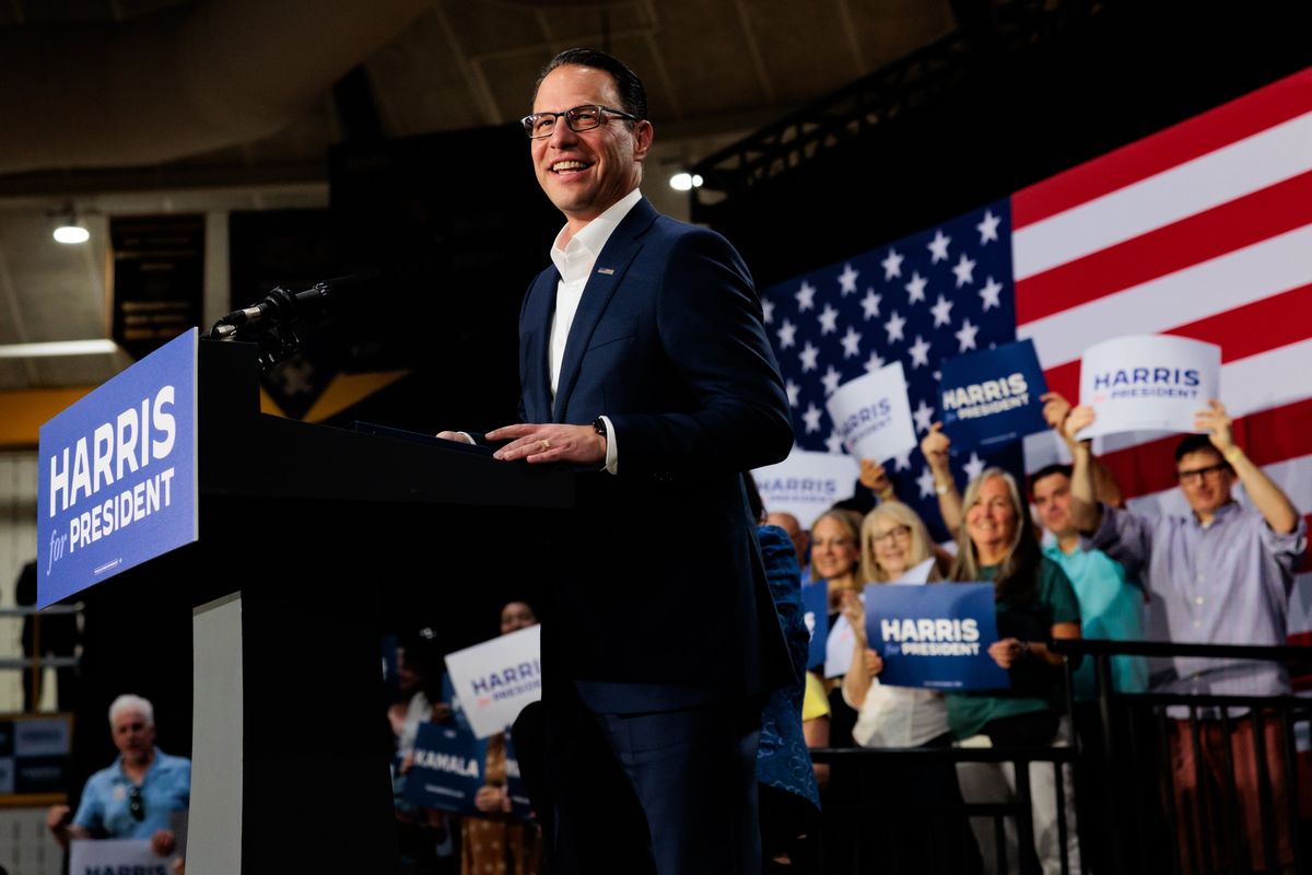 Pennsylvania Gov. Josh Shapiro speaks during a campaign rally for Vice President Kamala Harris on Monday in Ambler, Pa.  (Hannah Beier)