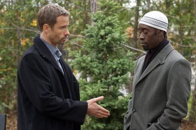 Guy Pearce, left, and Don Cheadle give top-notch performances in the thriller “Traitor.” (Associated Press / The Spokesman-Review)