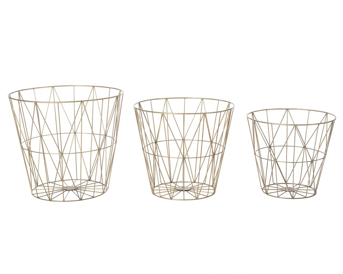 Annie Selke’s wire basket sets make handy trash bins, or they can also be used as decorative storage. (Courtesy of Annie Selke)