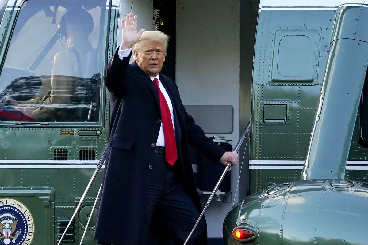 FILE - In this Wednesday, Jan. 20, 2021, file photo, then-President Donald Trump waves as he boards Marine One on the South Lawn of the White House, in Washington, en route to his Mar-a-Lago Florida Resort. Trump has named two lawyers to his impeachment defense team, one day after it was revealed that the former president had parted ways with an earlier set of attorneys.  (Alex Brandon)