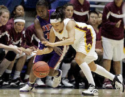 
Arizona State's Jill Noe, right, goes after a loose ball against Stephen F. Austin's Britany Vinson in the first half. 
 (Associated Press / The Spokesman-Review)
