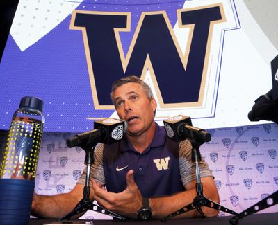 Washington head coach Chris Petersen speaks at the Pac-12 NCAA college football media day in Los Angeles Friday, July 15, 2016. (Reed Saxon / Associated Press)