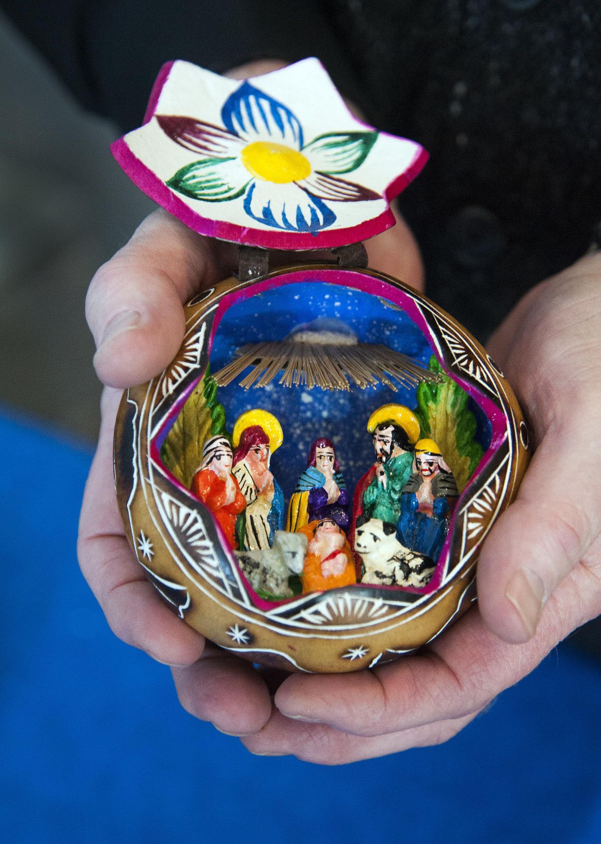 Fr. Tom Connolly’s Nativity scene in a gourd from Guatemala. (Dan Pelle / The Spokesman-Review)