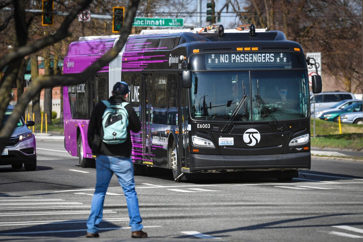 A new City Line bus pauses at a red light heading east on Mission Avenue at Hamilton Street on Friday in Spokane. The City Line has been test-driven along the route since mid-January, and it’s set to launch July 15.  (DAN PELLE/THE SPOKESMAN-REVIEW)