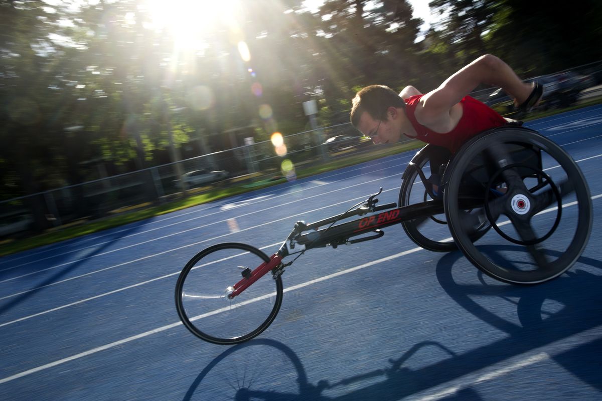 Isaiah Rigo warms up before competition Tuesday at Spokane Falls Community College in Spokane. (Tyler Tjomsland)