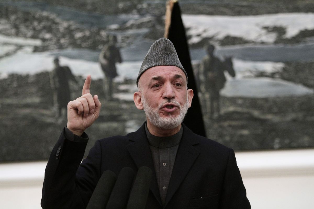 Afghan President Hamid Karzai speaks during a news conference in Kabul, Afghanistan, Saturday, May 4, 2013. Karzai says the director of the CIA assured him that regular funding his government receives from the agency will not be cut off. He says Afghanistan has been receiving such funding for more than 10 years and expressed hope at a Saturday news conference that it will not stop. (Rahmat Gul / Associated Press)