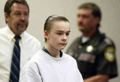 
Jake Eakin enters a Grant County Superior Courtroom in Ephrata, Wash., Thursday. Eakin is one of two boys accused in the Feb. 15, 2003, slaying of Craig Sorger, a special education student who was beaten and stabbed repeatedly.
 (Associated Press / The Spokesman-Review)