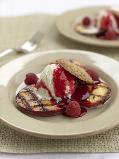 
Grilled Peaches served with Raspberry Sauce, vanilla ice cream and Citrus Crisps, make a sensational ending to a  barbecue. 
 (Associated Press / The Spokesman-Review)