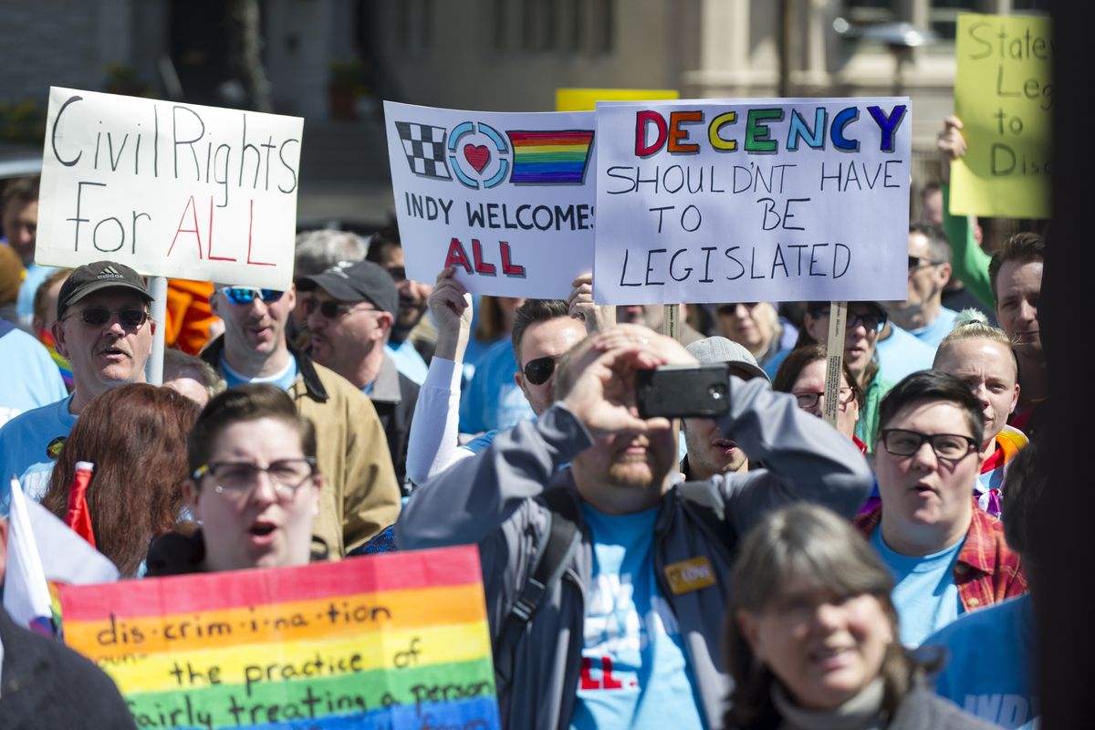 Opponents of Indiana Senate Bill 101, the Religious Freedom Restoration Act, gather for a demonstration in Indianapolis on Saturday. (Associated Press)