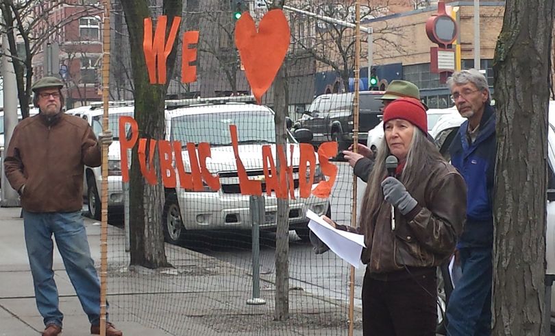 Gloria Flora, former national forest supervisor, speaks to a group of about 60 people supporting  federal public lands in a noon rally at the Federal Courthouse in downtown Spokane. (Rich Landers / The Spokesman-Review)