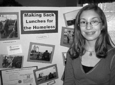 
Kailyn Steward, 11, is a fifth-grader at West Valley City School. A recent school project took her to the streets of Spokane where she handed out sack lunches to panhandlers.
 (Jennifer LaRue / The Spokesman-Review)