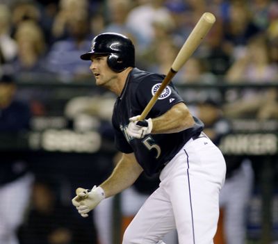 Mariners designated hitter Mike Sweeney singles in the second inning Friday. (Associated Press / The Spokesman-Review)