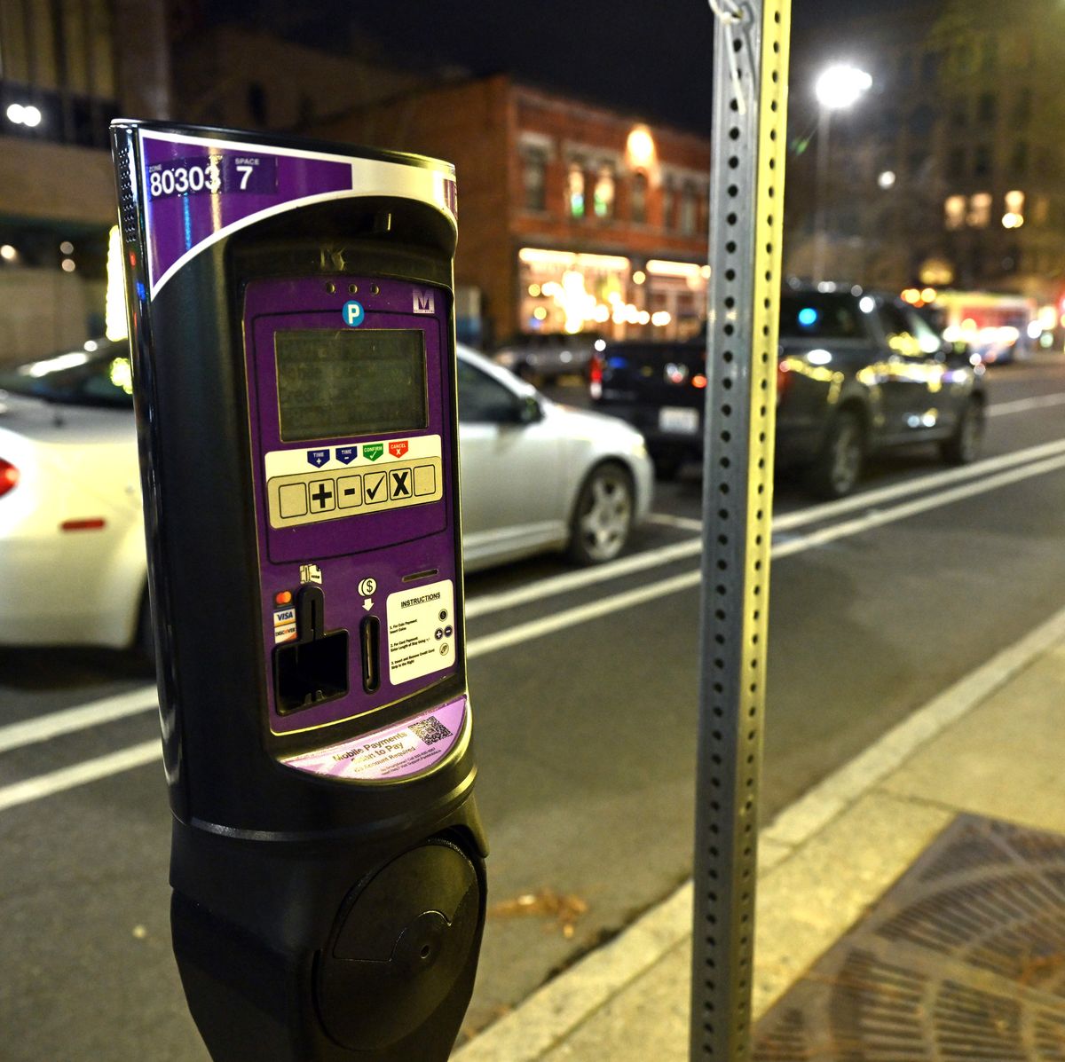 Present day: Modern parking meters, accepting coins, credit cards and payment via cellphone apps, line Riverside Avenue in downtown Spokane. Since 1942, meters have prompted longtime parkers to move on, turning over spaces to others who are heading to Spokane’s downtown stores, restaurants and businesses.  (Jesse Tinsley/THE SPOKESMAN-REVIEW)