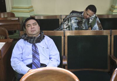Assembly members Van Tran, left, and Joe Coto sleep in the back of the Assembly chamber early Sunday in Sacramento, Calif.  (Associated Press / The Spokesman-Review)