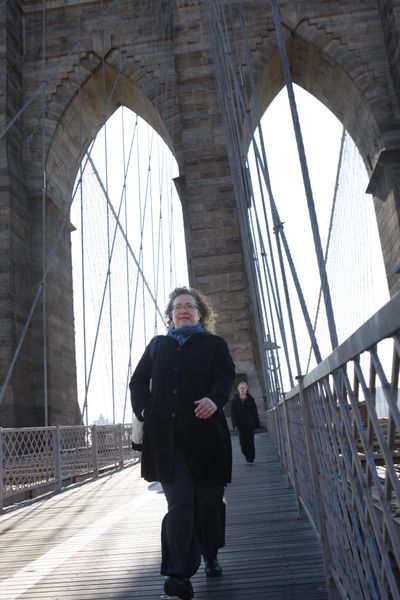 Camilla Brooks commutes to work by walking over the Brooklyn Bridge in New York. (Associated Press)