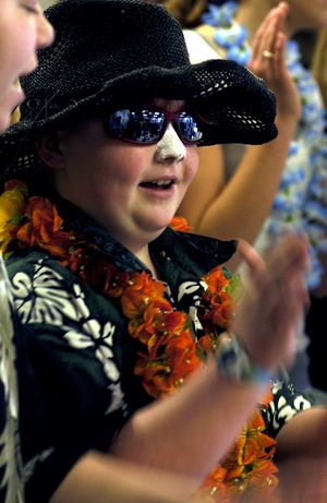 Holy Family Catholic School 6th grader Emily Cahill dressed in her best Hawaiian clothing for the last day of Catholic Schools Week on Friday, January 29, 2010. (Kathy Plonka)