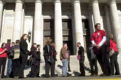 
Eastern Washington University students lobby lawmakers Tuesday outside the Capitol in Olympia for Higher Education Day.
 (Associated Press / The Spokesman-Review)