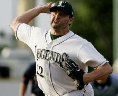 
Roger Clemens fires one of his 62 pitches for the Class-A Lexington Legends.
 (Associated Press / The Spokesman-Review)