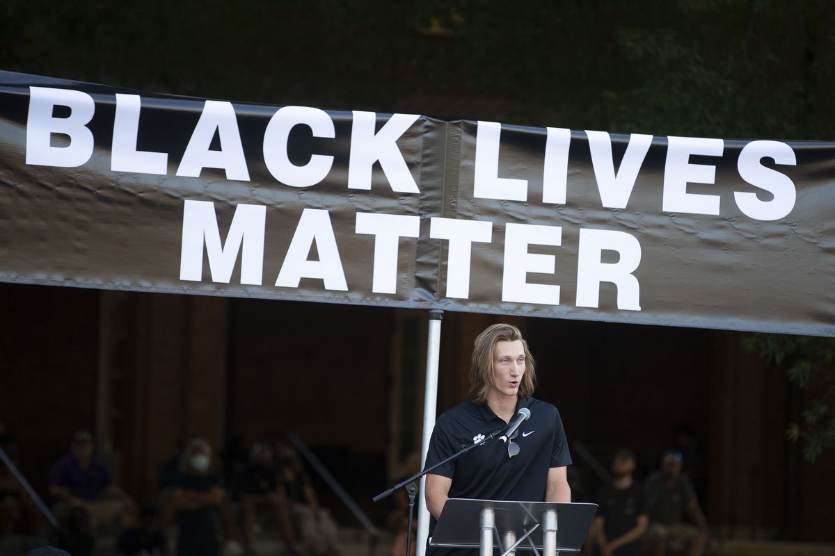 Clemson quarterback Trevor Lawrence speaks during a protest over the death of George Floyd Saturday, June 13, 2020, in Clemson, S.C. This summer college athletes have organized campus marches, threatened boycotts, and been trending on social media as if they had just scored game-winning touchdowns without stepping foot on a field.  (John Bazemore)