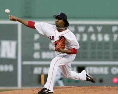 
If Yankees owner George Steinbrenner has his way, Boston's Pedro Martinez will be pitching for New York next season.
 (Associated Press / The Spokesman-Review)