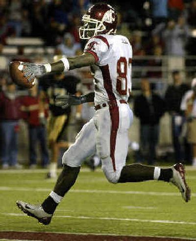 
One of Jason Hill's 10 TD catches this year came on this play against Idaho. 
 (File/ / The Spokesman-Review)