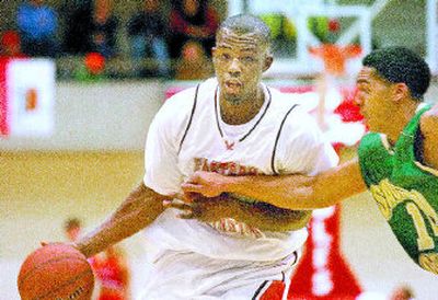 
Rodney Stuckey, left, dribbles against Sacramento State's Roderick Adams in what may have been his final game with Eastern. 
 (Ingrid Lindemann / The Spokesman-Review)