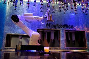 A robot prepares drinks at the Tipsy Robot Vegas on Thursday at the Miracle Mile Shops in Las Vegas. (Tyler Tjomsland/The Spokesman-Review)