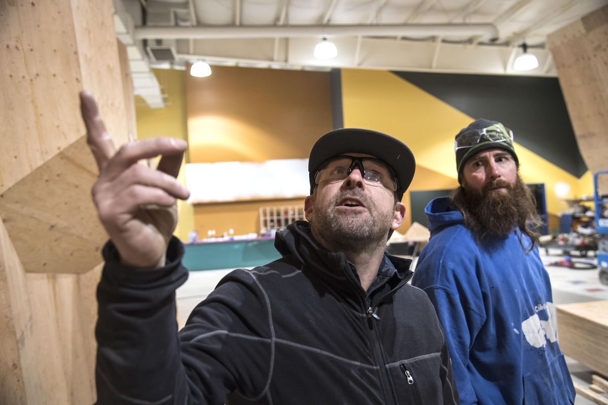 Shawn Olcott and Adam Healy view the progress of their new Bloc Yard Bouldering Gym, Feb. 2, 2017, at 233 E. Lyons in Spokane, Wash. (Dan Pelle / The Spokesman-Review)