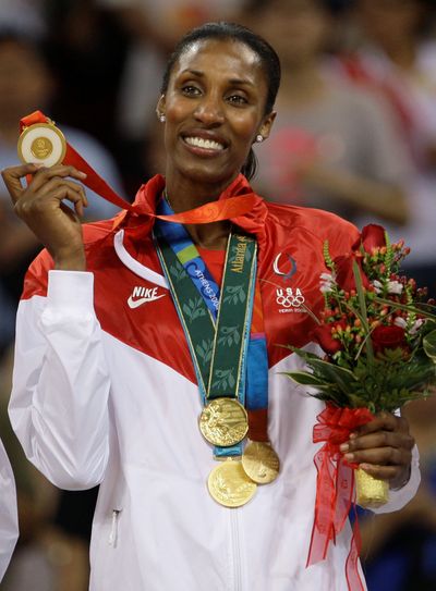 Associated Press United States basketball player Lisa Leslie packed for the Beijing Olympics with a purpose, bringing along the gold medals she won in Atlanta, Sydney and Athens to go with the fourth she won Saturday. (Associated Press / The Spokesman-Review)