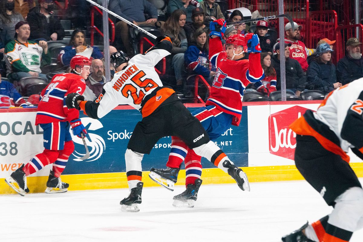 Medicine Hat defenseman Niilopekka Muhonen collides with Spokane Chiefs forward Assanali Sarkenov during a game at Spokane Arena on Jan. 24, 2025. (Larry Brunt/Spokane Chiefs)