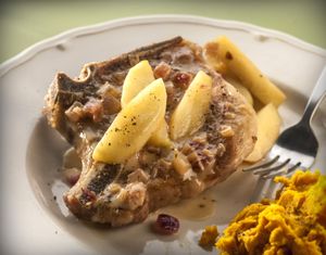 Pork chops paired with apples three ways – apples, apple cider and applejack – make a quick, comfort-food dinner.