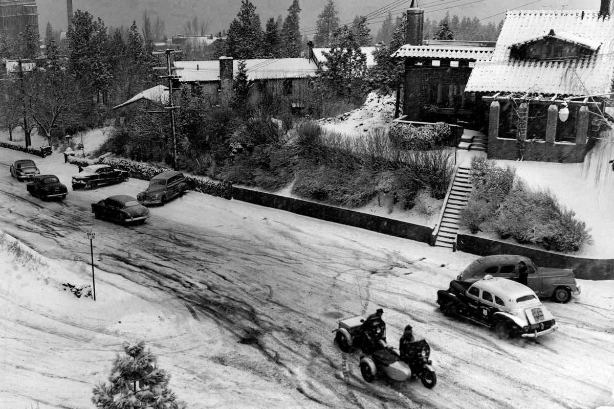Dec. 16, 1949: Slow-moving traffic makes its way up Grand Boulevard.