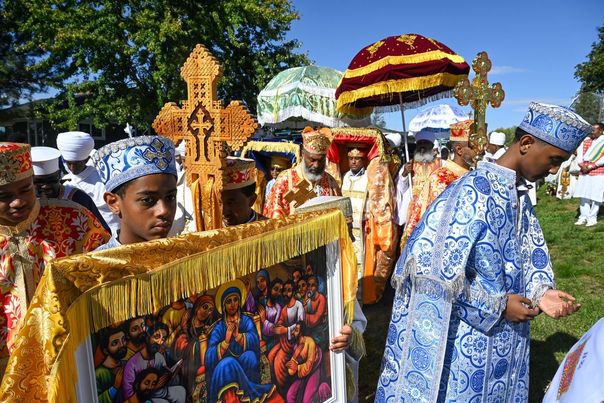 Clergy carry the Ark of the Covenant replica in procession with the congregation around the new St. Mary’s Ethiopian Orthodox Tewahedo Church on Saturday in Spokane. (DAN PELLE/FOR THE SPOKESMAN-REVIEW)