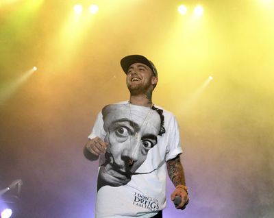 Rapper Mac Miller performs July 13, 2013, on his Space Migration Tour at Festival Pier in Philadelphia. Spotify has released a couple of new tunes from the late rapper. (Owen Sweeney / Invision)