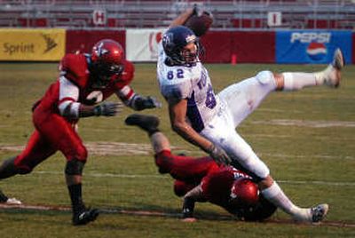 
EWU sophomore Kevin Hatch, bottom, and senior Ira Jarmon, left, are key components in the Eagles' solid defense. 
 (Jesse Tinsley / The Spokesman-Review)
