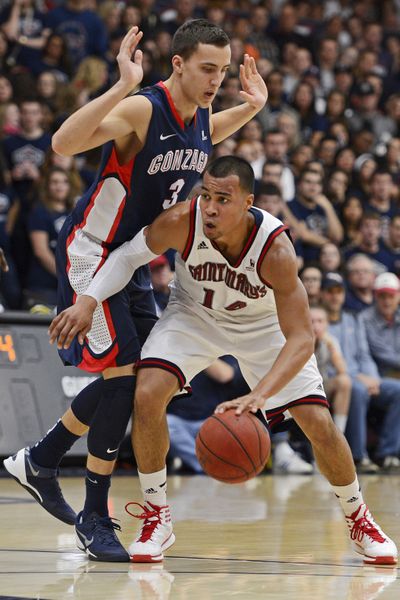 Kyle Dranginis, left, and the rest of the Zags held Stephen Holt of Saint Mary’s without a field goal. (Associated Press)