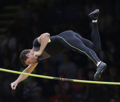 Brad Walker clears the bar in men's pole vault at the U.S. Olympics Trials. (Associated Press)