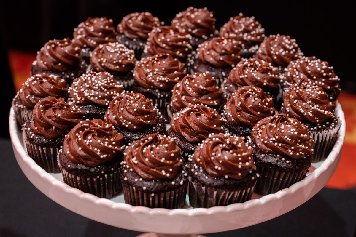 At the Sweet Frostings Blissful Bakeshop booth, cupcakes await sampling during the 2020 Decadence! Chocolate Festival at the Davenport Grand.  (Colin Mulvany/The Spokesman-Review)