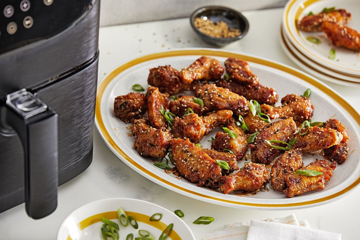 The air fryer excels at cooking small cuts of protein, such as these Korean-Style Chicken Wings.  (Tom McCorkle/Washington Post)
