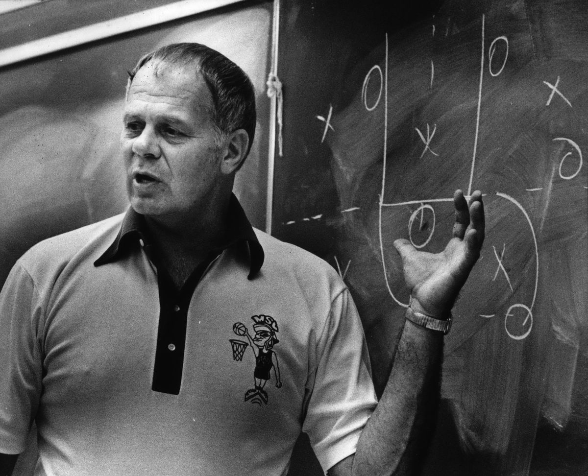 In this file photo, Jud Heathcote-Washington State University basketball coach drawing up plays. (FILE / SR)