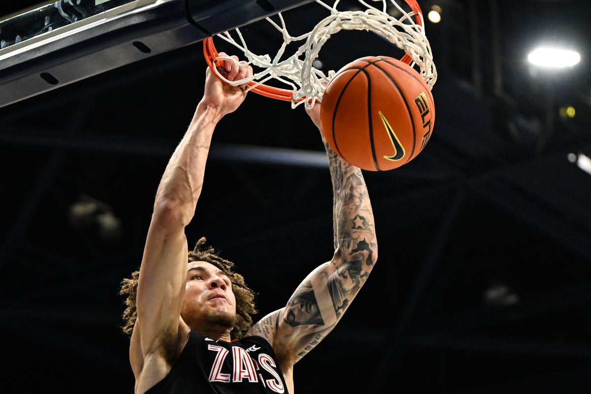 Gonzaga Bulldogs guard Jalen Warley (8) dunks the ball against the San Diego Toreros during the second half of a college basketball game on Tuesday, Dec 30, 2025, at Jenny Craig Pavilion in San Diego, Calif. The Gonzaga Bulldogs won the game 99-93.  (Tyler Tjomsland/The Spokesman-Review)