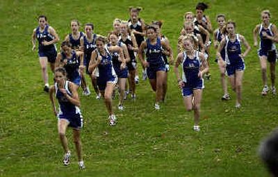
Mt. Spokane, Gonzaga Prep and Lewis and Clark runners are off to the races at Manito Park Wednesday.
 (Brian Plonka / The Spokesman-Review)
