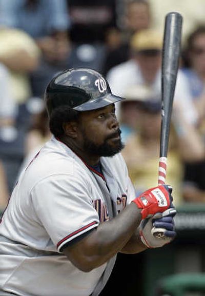 
Washington Nationals' Dmitri Young follows the flight of the ball after hitting a single against the Pirates on July 1. Associated Press
 (Associated Press / The Spokesman-Review)