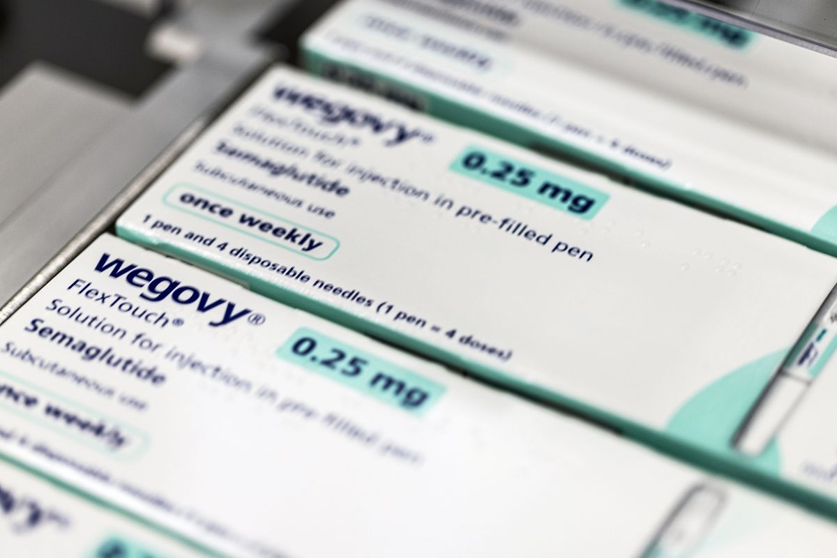 Packets of the medication Wegovy move along a conveyor at the Novo Nordisk A/S production facilities in Hillerød, Denmark in 2023. (Carsten Snejbjerg/Bloomberg)