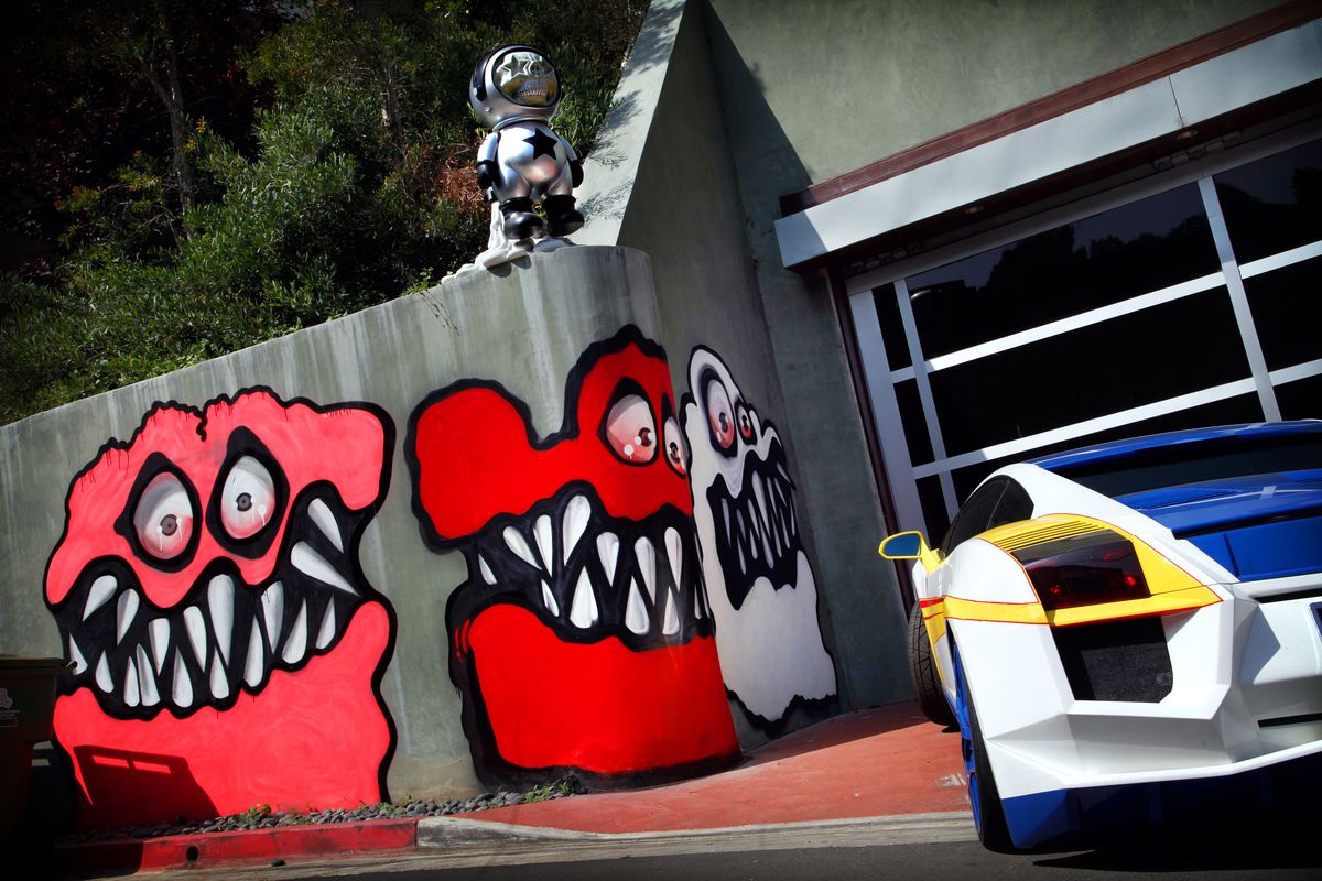 Neighbors are angry at singer Chris Brown’s street art painted outside his Los Angeles home. (Associated Press)