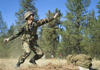 
Gonzaga University cadet Lance Lorenz prepares to lob a grenade at a target Saturday during the Army ROTC Ranger Challenge Competition.  
 (Ingrid Lindemann / The Spokesman-Review)