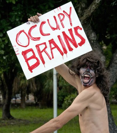 A Zombie Ride participant makes a statement at Fantasy Fest in Key West, Fla., on Oct. 23. (Associated Press)